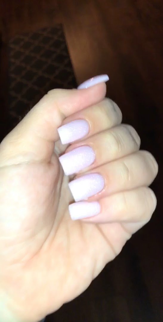 Spa-style nail tables with soft lighting